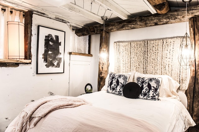 bedroom featuring beam ceiling