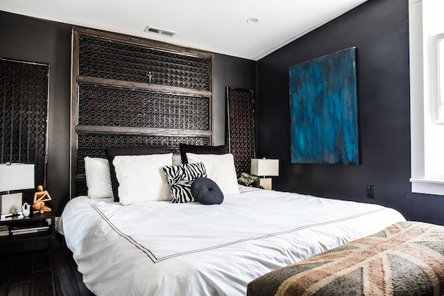 bedroom featuring hardwood / wood-style flooring