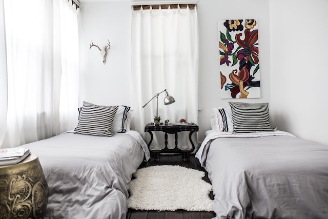 bedroom with wood-type flooring