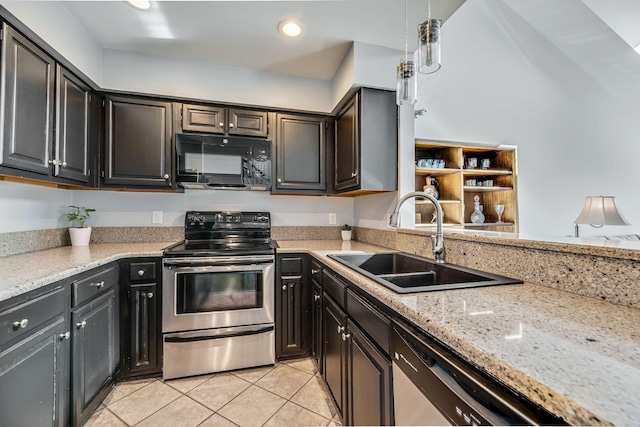 kitchen with stainless steel appliances, sink, light tile patterned floors, and light stone counters