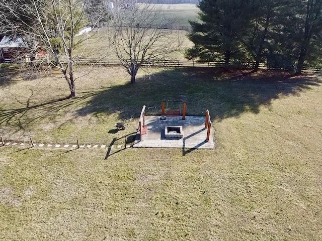 view of yard featuring a patio and a rural view