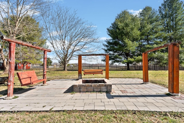 view of patio featuring a fire pit