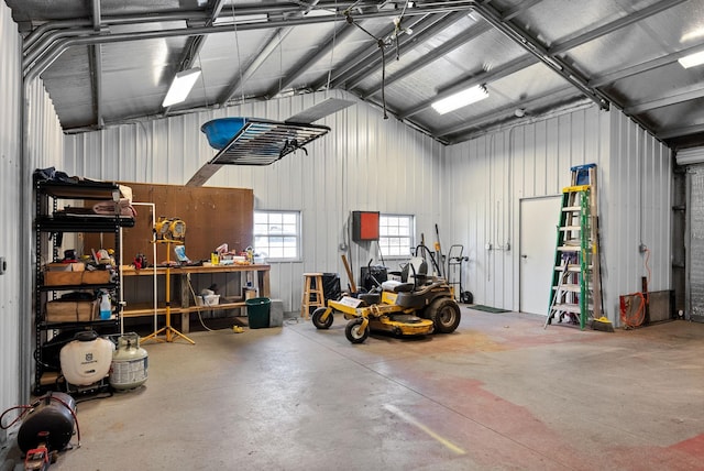 garage with a workshop area