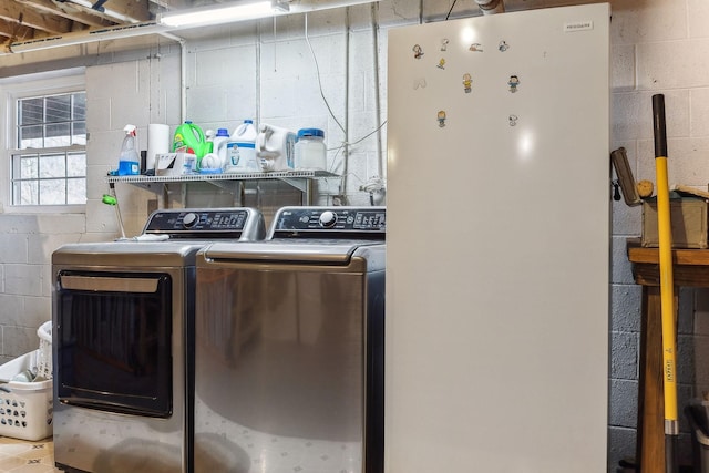 laundry room featuring washing machine and dryer