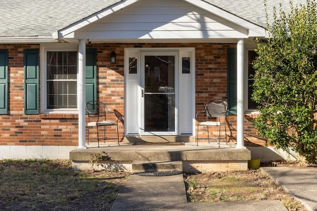 doorway to property with covered porch