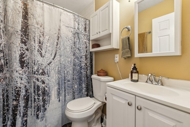 bathroom with a shower with curtain, vanity, and toilet