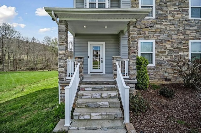 entrance to property with a yard