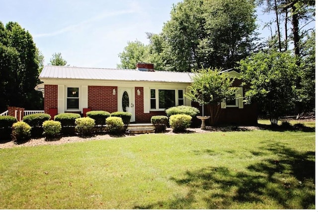 ranch-style house with a front lawn