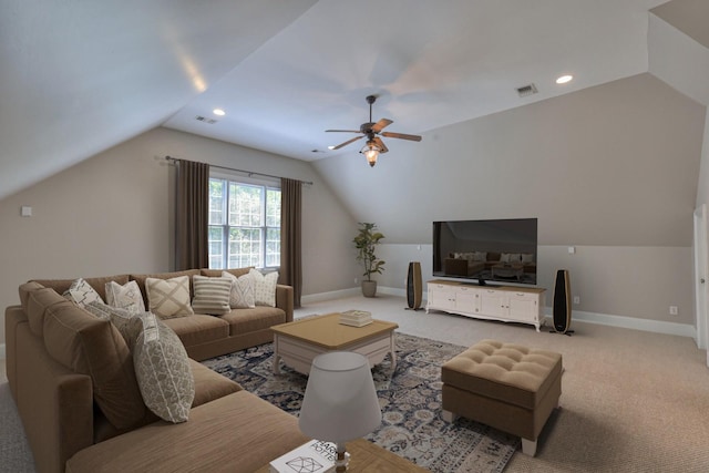 living room with vaulted ceiling, light colored carpet, and ceiling fan