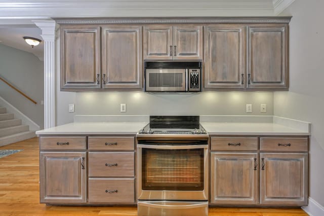 kitchen featuring stainless steel appliances and light wood-type flooring