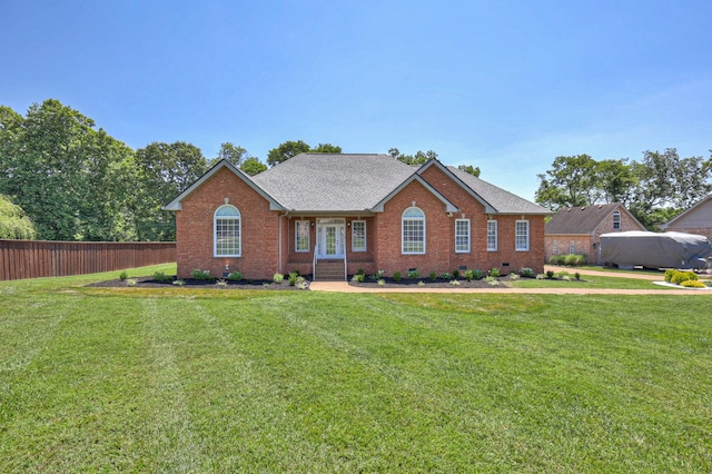 ranch-style house with a front lawn