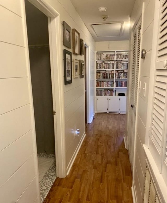 corridor with dark wood-type flooring