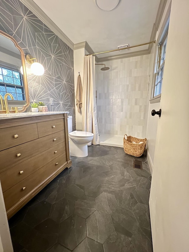 bathroom with vanity, crown molding, toilet, and a shower with shower curtain