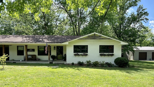 single story home with a porch, a garage, and a front lawn