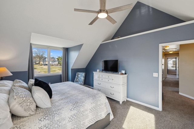 carpeted bedroom with vaulted ceiling and ceiling fan