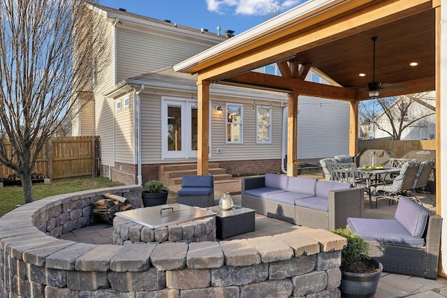 view of patio / terrace featuring ceiling fan