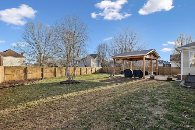 view of yard featuring a gazebo, central AC, and a patio area