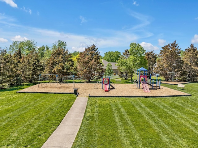 view of playground with a yard