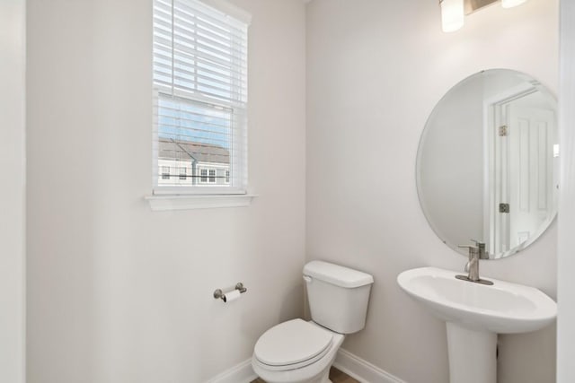 bathroom with sink and toilet