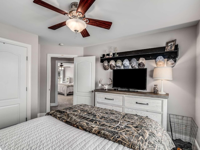 bedroom featuring ceiling fan and carpet flooring