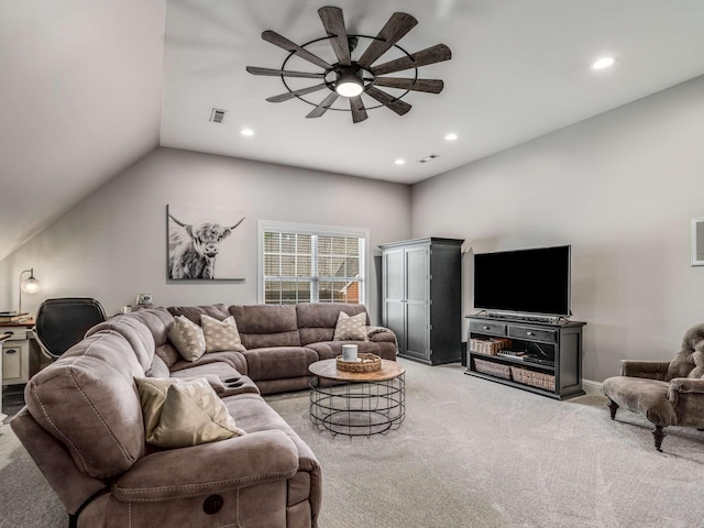 carpeted living room with ceiling fan