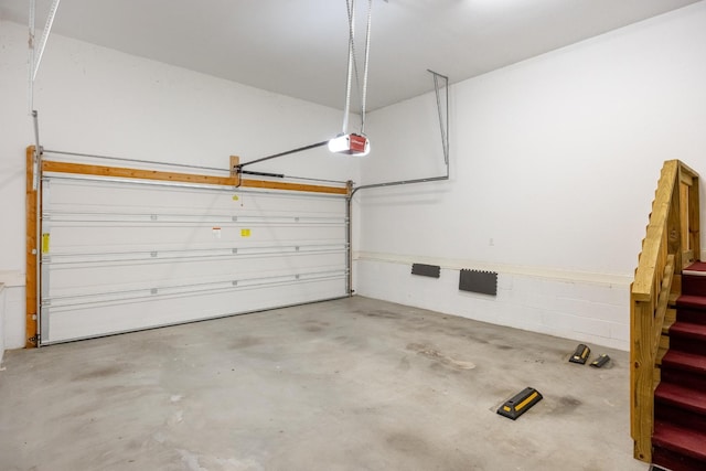 garage featuring a garage door opener