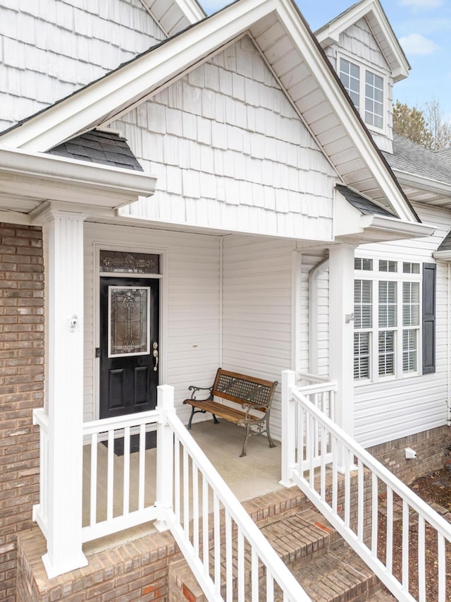 doorway to property featuring a porch