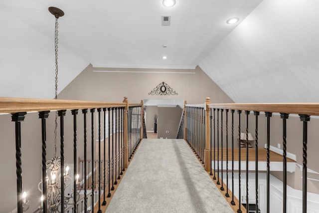 hallway featuring recessed lighting, visible vents, and vaulted ceiling