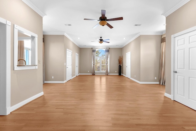 unfurnished living room with crown molding, baseboards, visible vents, and light wood-type flooring