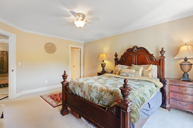 bedroom with ceiling fan, baseboards, carpet, and ornamental molding