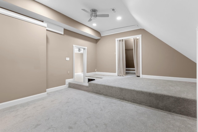 bonus room with baseboards, a ceiling fan, lofted ceiling, and carpet floors