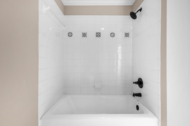 full bath with shower / bathtub combination and ornamental molding