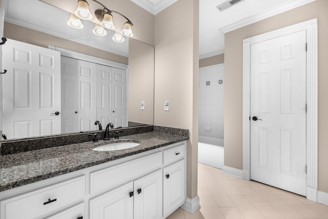 bathroom with visible vents, ornamental molding, shower / bathing tub combination, tile patterned flooring, and vanity