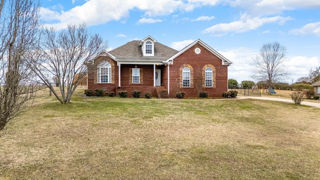 view of front of property featuring a front lawn and a porch