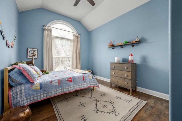 bedroom featuring vaulted ceiling, dark hardwood / wood-style floors, and ceiling fan