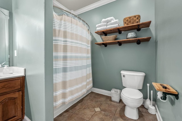 bathroom with vanity, a shower with curtain, ornamental molding, and toilet