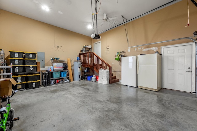 garage with white refrigerator, a garage door opener, and water heater