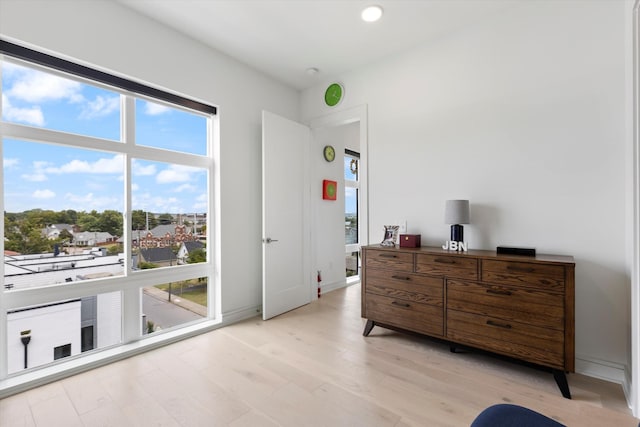 bedroom with light hardwood / wood-style flooring