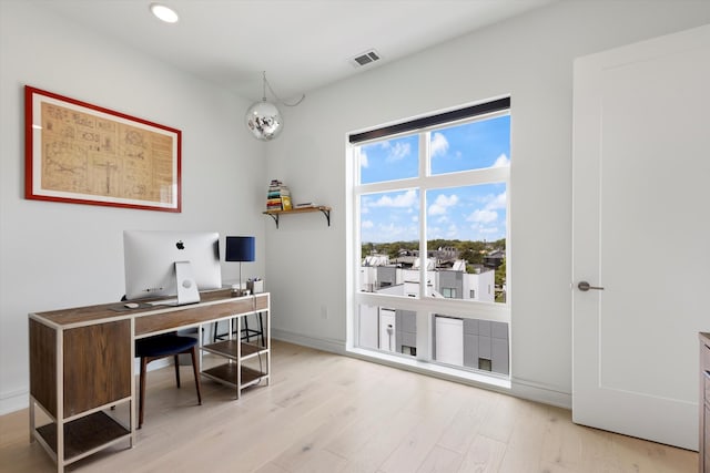 office space featuring light hardwood / wood-style flooring