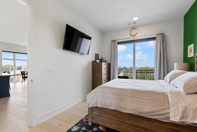 bedroom featuring light wood-type flooring