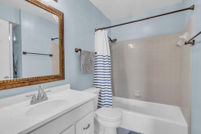 full bathroom featuring vanity, shower / bath combination with curtain, and toilet