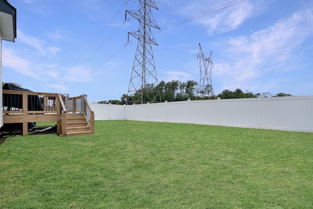 view of yard with a deck