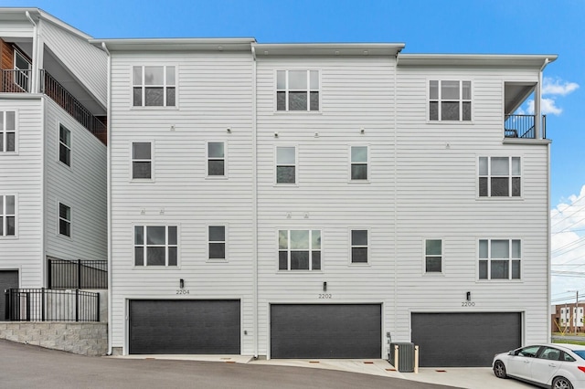 view of property with central AC unit