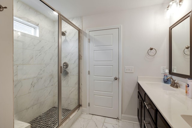 bathroom with vanity and an enclosed shower