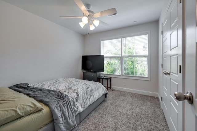 carpeted bedroom featuring ceiling fan