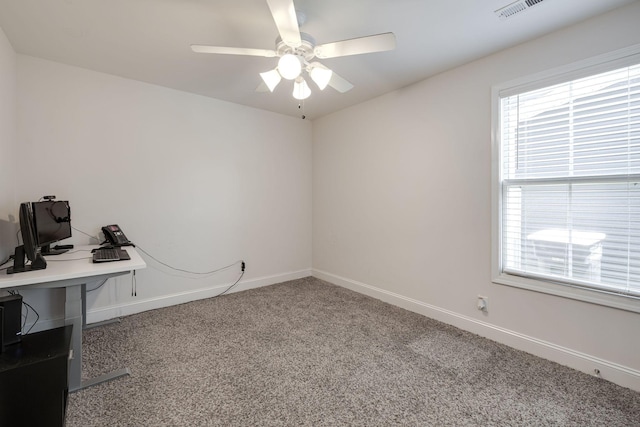 home office with carpet flooring and ceiling fan