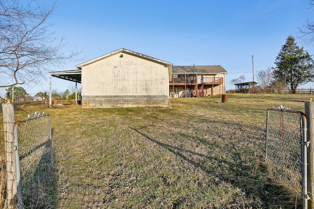 view of yard with a wooden deck