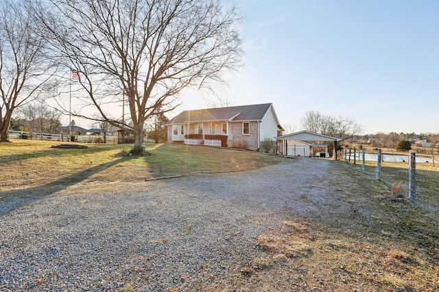 view of front of property featuring a garage and a front yard