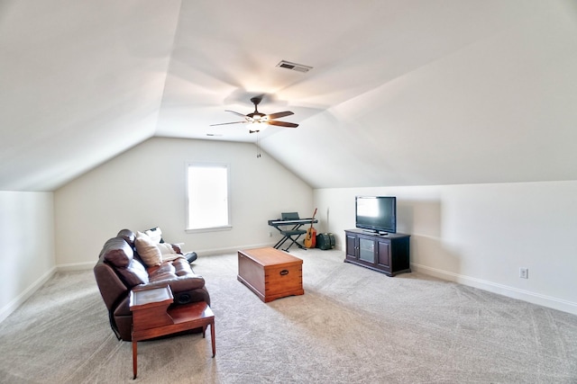 carpeted living room with lofted ceiling and ceiling fan