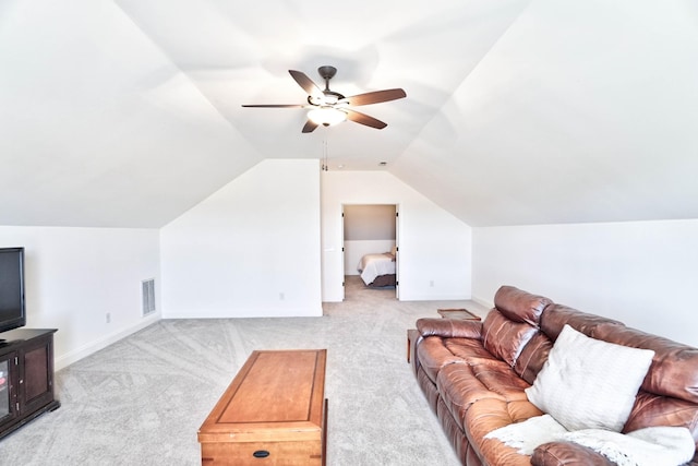 carpeted living room featuring lofted ceiling and ceiling fan